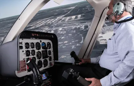 student pilot in a helicopter simulator