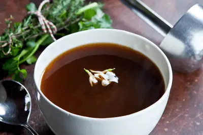 Beef consommé in a bowl