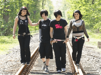  group of teenagers wearing emo clothing