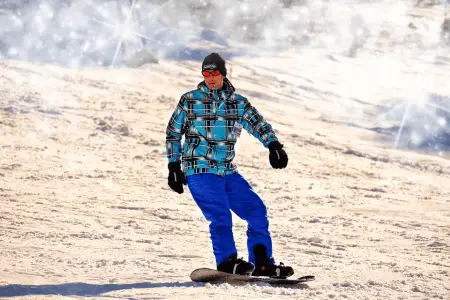 snowboarder wearing a snowboard jacket