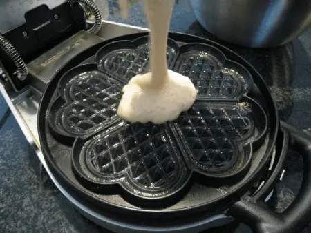 Waffle batter in a waffle iron